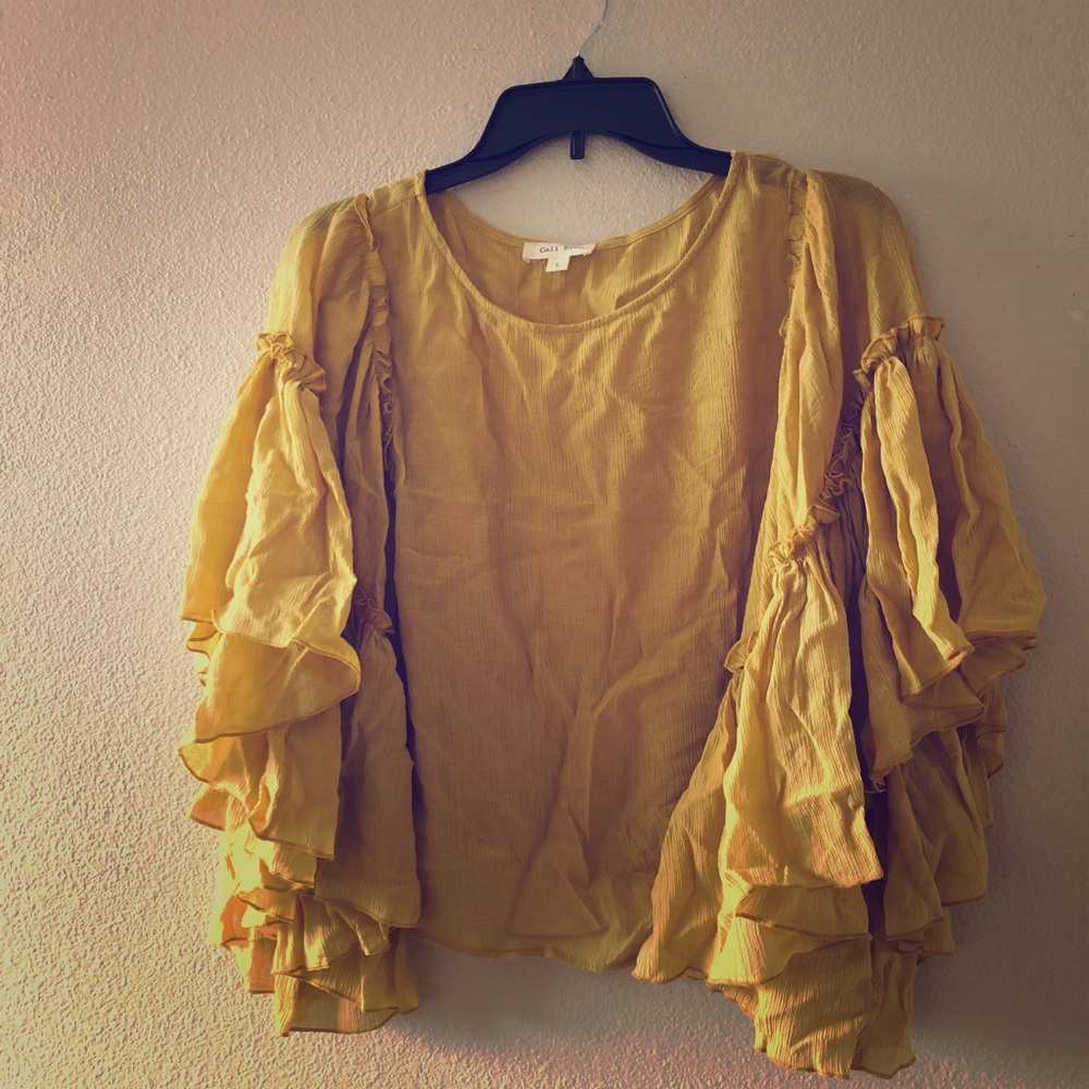Flowy mustard yellow cropped top.